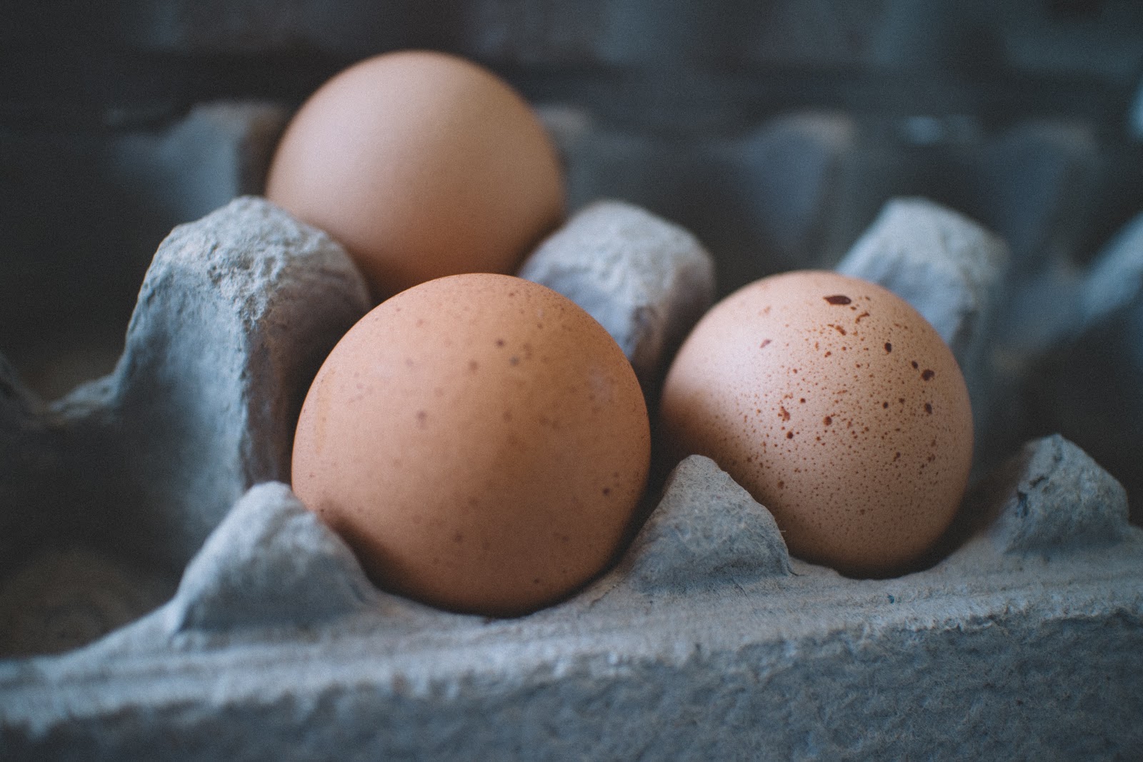 Close-up of a carton of brown eggs